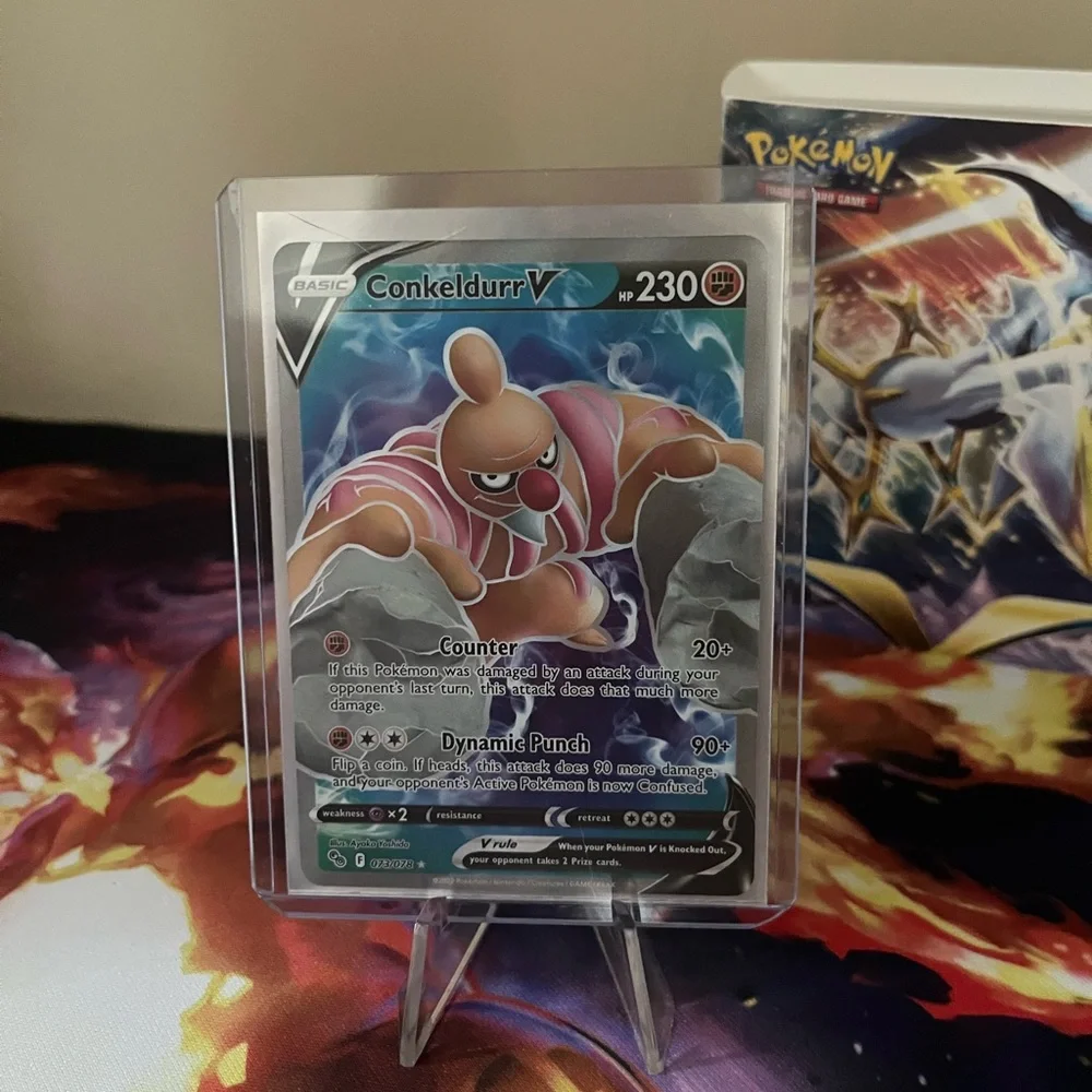 Conkeldurr V Pokémon Card with Small sorting booklet